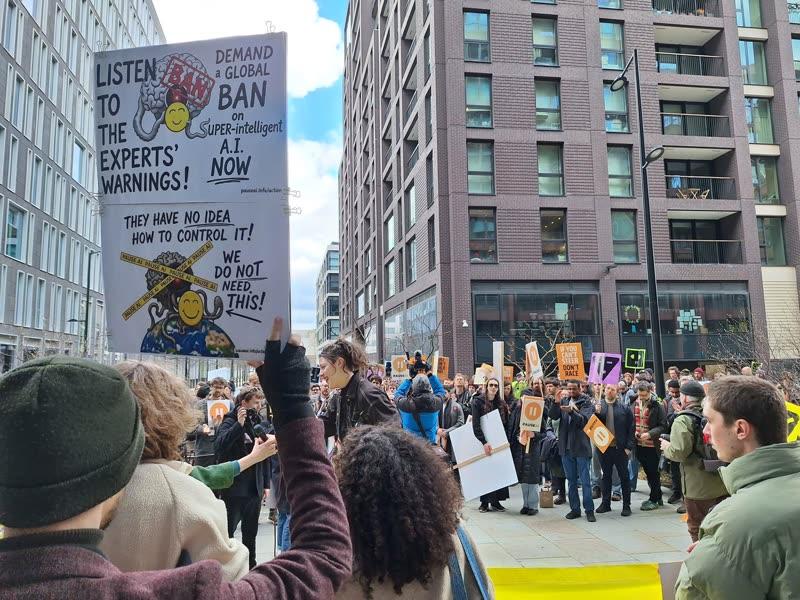 PauseAI banner at the head of the March for AI Safety